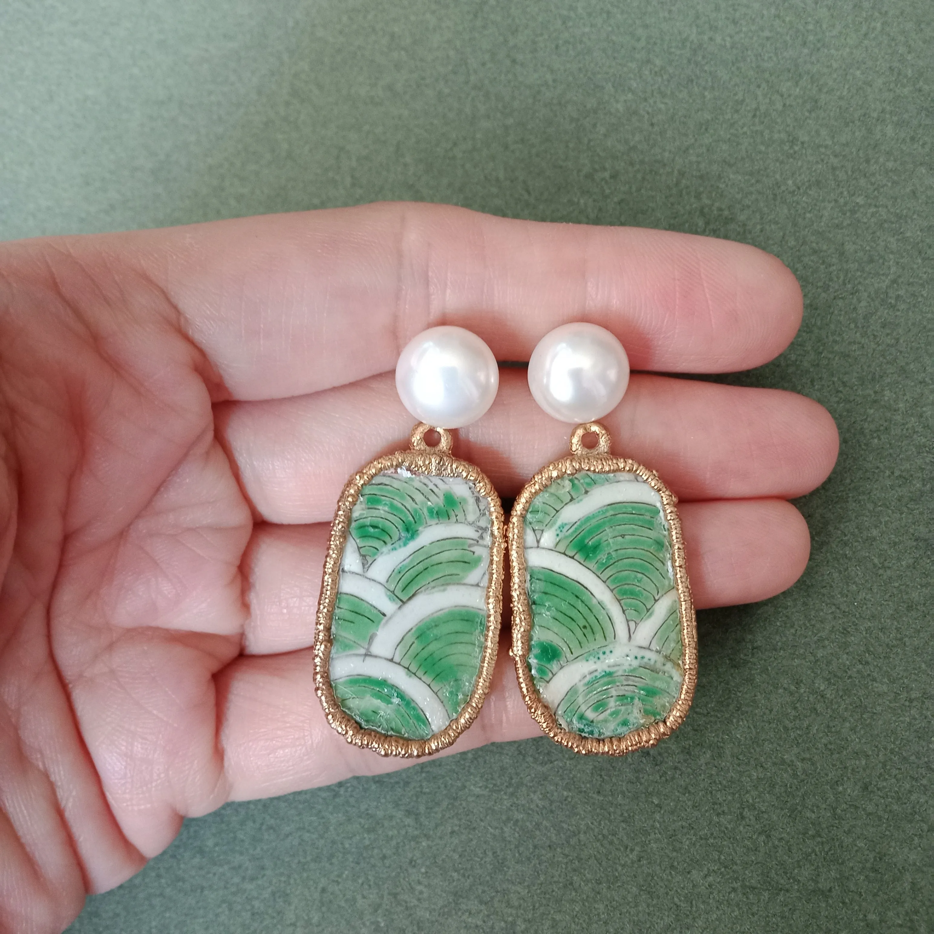 Lapping waves green porcelain earrings